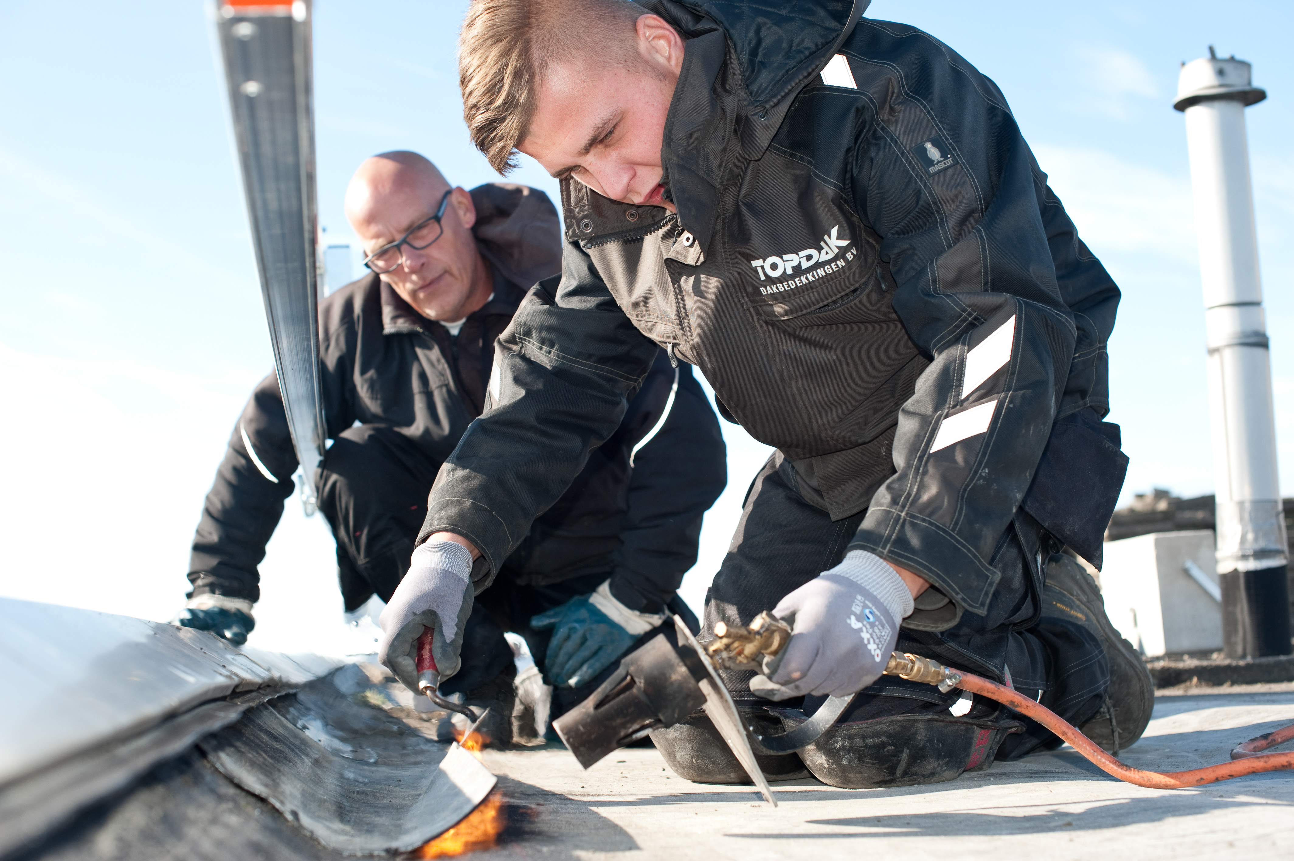 Afbeelding Dakdekker bitumen en kunststof
